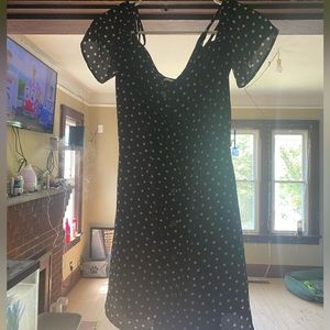 Black polka dot shirt